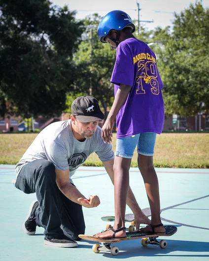 <!--desotob4b-->
Brian was busy giving lots of kids their first skateboard lesson and passing on a love of all things skateboarding.