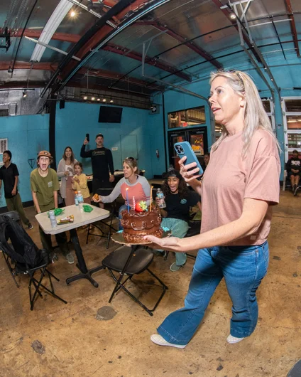 Robin came in with a cake to celebrate Shiloh's birthday. Josh Tancos is in the background looking like he would commit a felony for a slice. I'm not messing with him!

<!--polarvideopremier2022-->