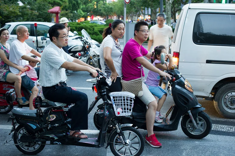 <!-- damnamchina2013 -->

It was very common to see way to many people on one scooter. So sketchy.