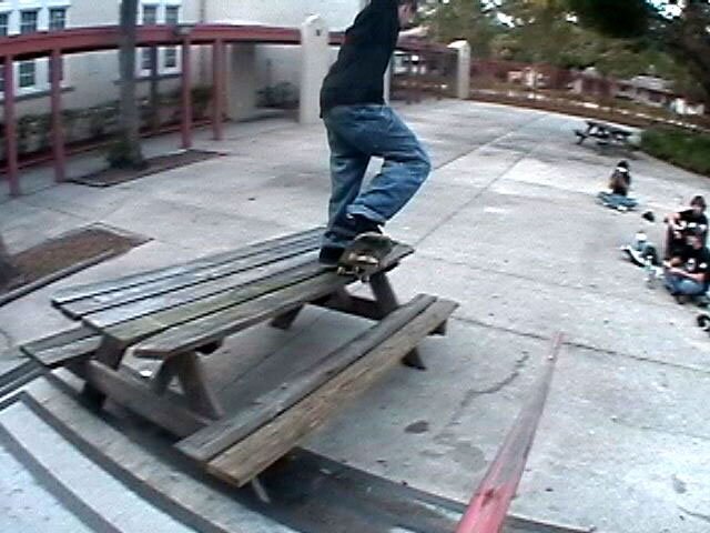 Matt Romano doing a Crook down a picnic bench