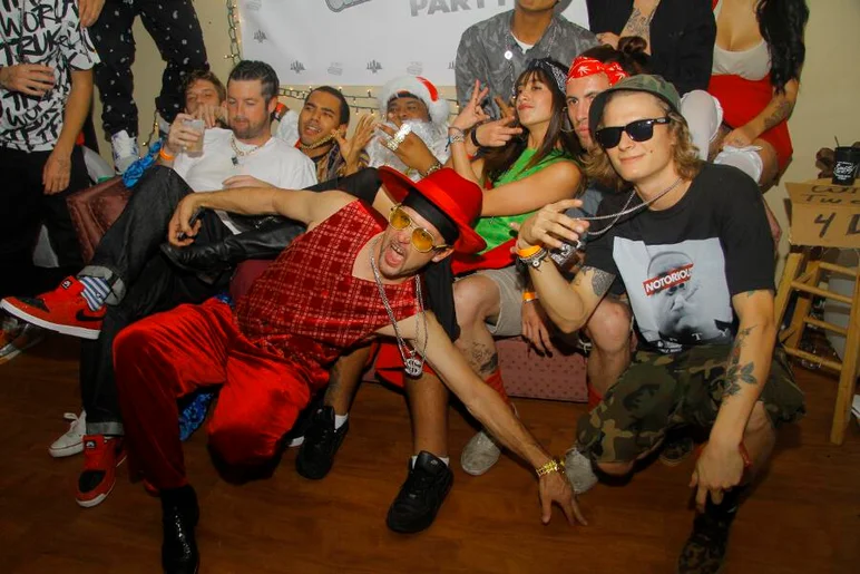 <!-- ghettoxmasthirteen -->

The drinks were flowing and the hype was growing. Everyone loves a photo shoot.