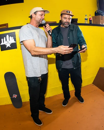 Brian and Paul taking iPhone lessons during the closing ceremony <!--harvestjam21-->