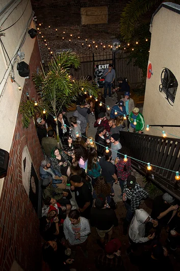 <!--pro16frinight-->

The back patio at The Bricks is packed as usual.