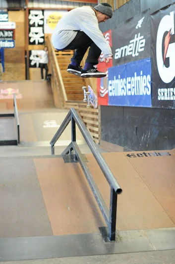 Albert Nyberg - fakie flip over the rail.<!-- etnies Free Day Benefiting Boards for Bros 2013 -->