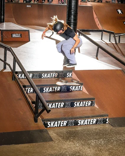 If you stare hard enough you'll see Taylor's board blending in with the stairs as she is about to land a v heel and seal the deal on the Women's Division with a 1st place win

<!--backtoschoolbash23-->