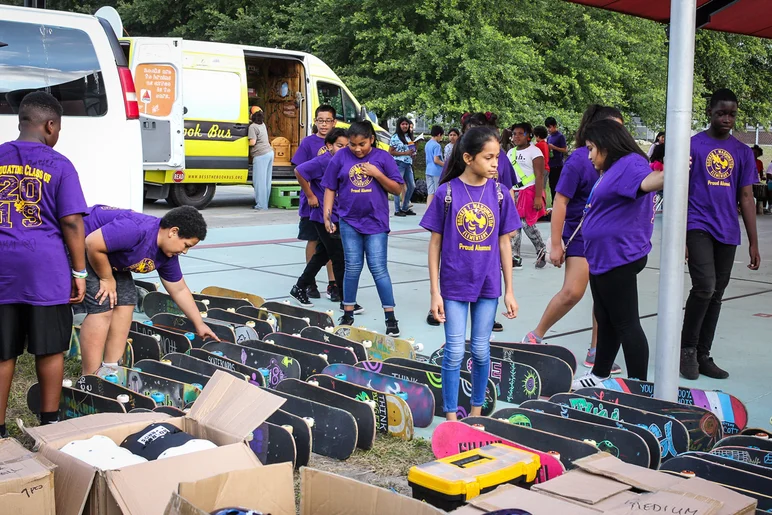 <!--desotob4b-->

The boards were all laid out ready for the kids to choose their very own first skateboard. Bess the Book Bus was filled with hundreds of books for the kids to choose.