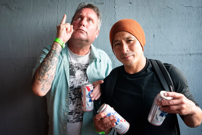 Daewon double fists while Lance points towards the heavens.

<!--tampapro23day2-->