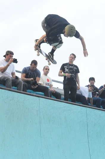 Mike Frazier is about to smash this tailgrab  into a backside disaster like lightning striking on the coping.<!-- Tampa Pro 2013 Thursday and Friday -->