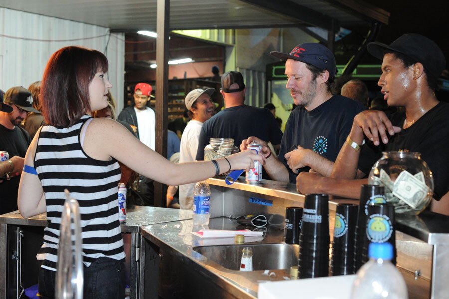 Paul Shier and Ishod set up to the sauce stand