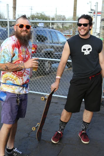 <!--eotmfeb16-->

Maintenance alumni Aaron Burkett and a Tampa Pro temp staff member hanging out with some drinks. Look at that mullet-tail!