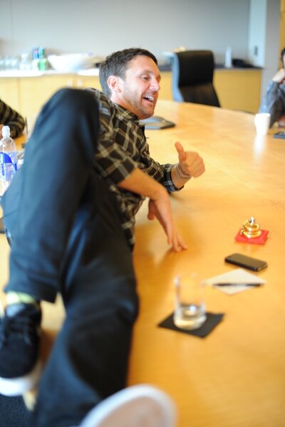 Schaefer makes sure the conference table is up to 
