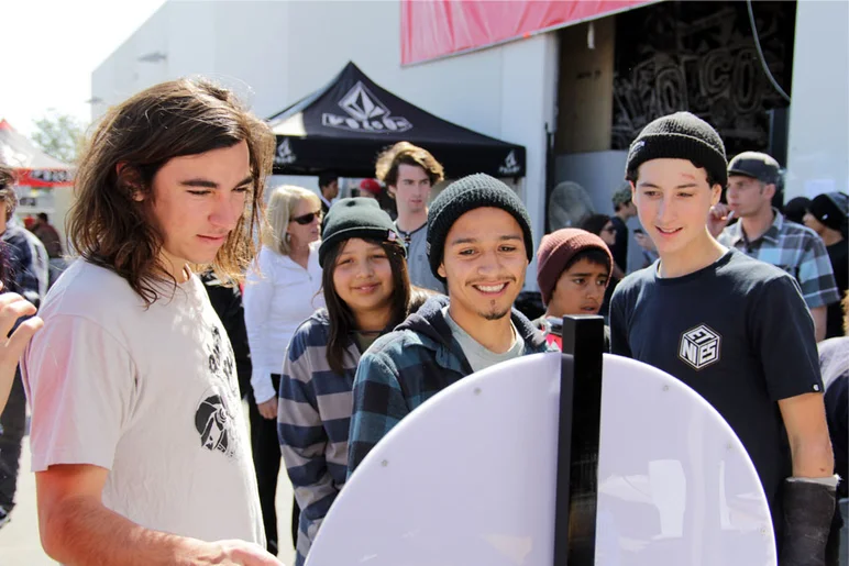 The scene outside, where everyone was aiming for one spot on the Wheel of Fortune.<!-- Damn Am Costa Mesa 2013 Presented by Volcom -->