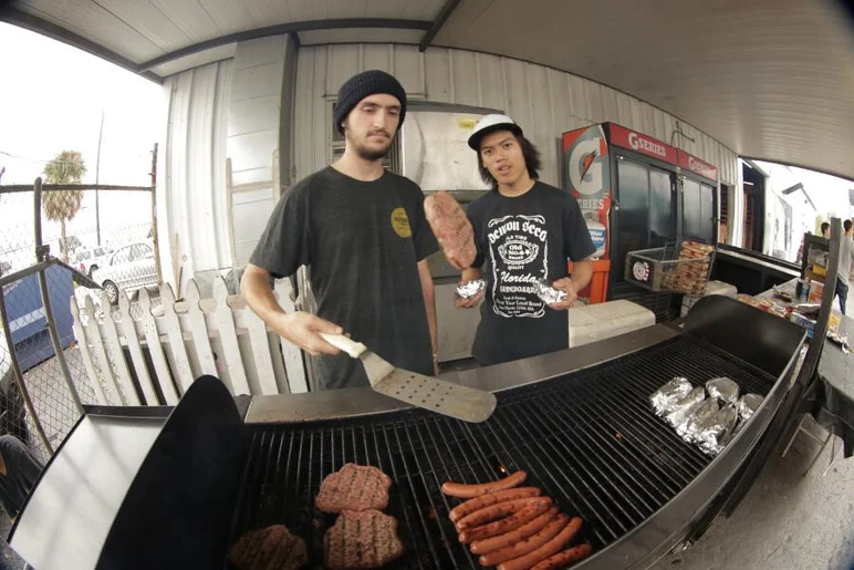 <!-- 2013harvestJam -->

Andy and Yoda flipping burgers while everyone else is flipping their skateboards.