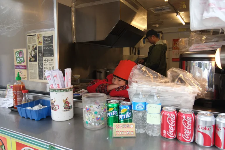 Chinese food is a popular one in the trucks.  This lady's over it, though.<!-- Portland 2013 for Some Nike Bid'niss -->