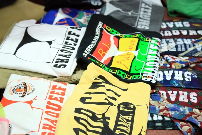 <!-- shaqueefapremiere13 -->

This is a small sample of the one-of-a-kind Shaqueefa shirts on the merchandise table at the premiere.