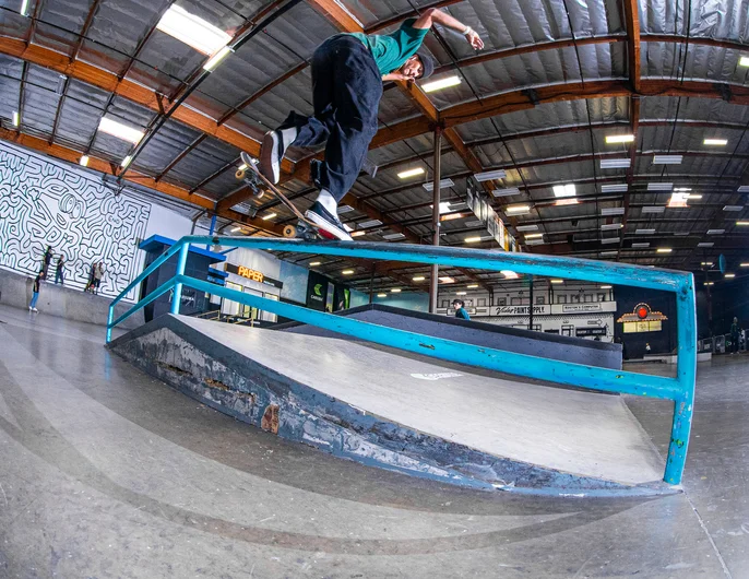 Malique Simpson warming up on the a-frame with a back over crook

<!--damnamla2023-->