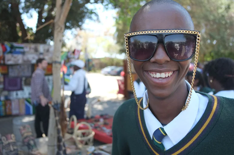 This kid is flossing hard on the field trip.<!-- South Africa: Johannesburg for a Day and on to Kimberley -->