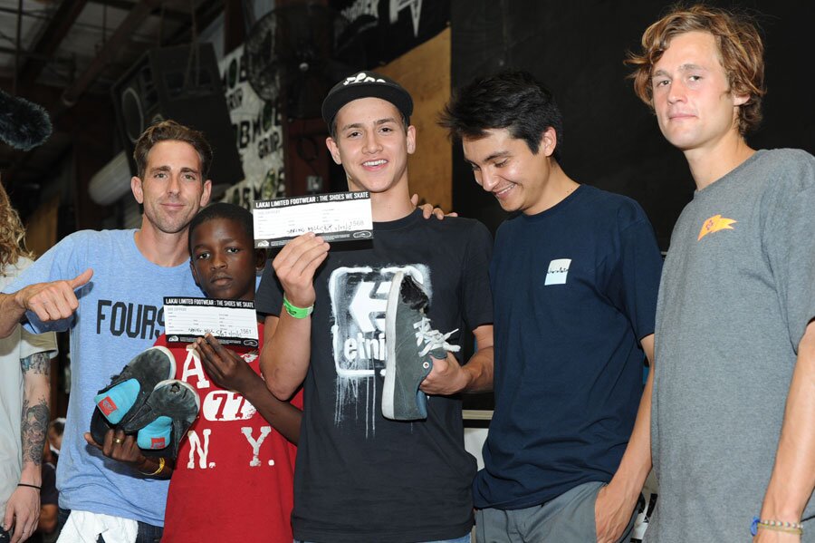 Guy gave out Lakai shoe certificates to kids