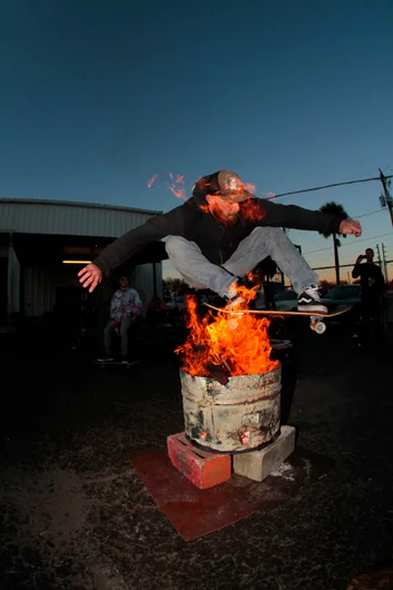 <!--ombj15-->

This could be the wildest photo I got all night. Fire in Bryan Adams face as he follows Glancy with the Ollie.