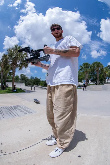<!--gsd21-->
Jason Malley behind the lens getting ready to the cash for tricks on the bump to barrier.
