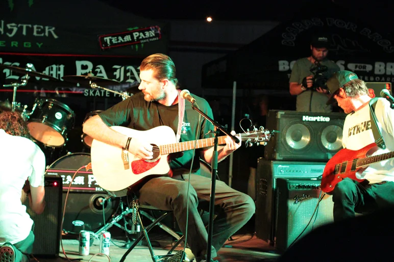 <!--pro15satnight-->
Rob Welsh was busy tuning his guitar before they got started.