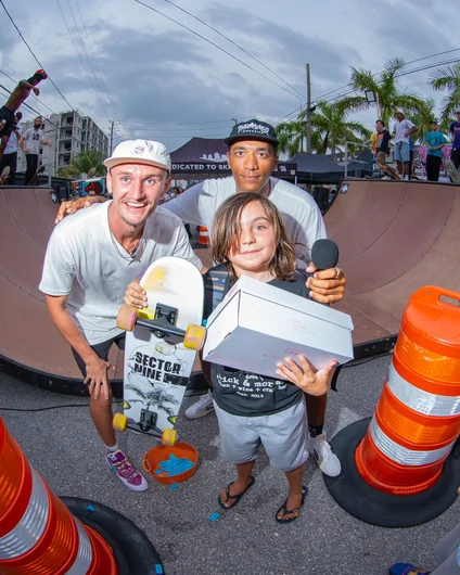 This kid was the closest to the raffle so they picked him as a winner. He was extremely surprised and not ready for a photo at all!

<!--skatingacrossborders2022-->