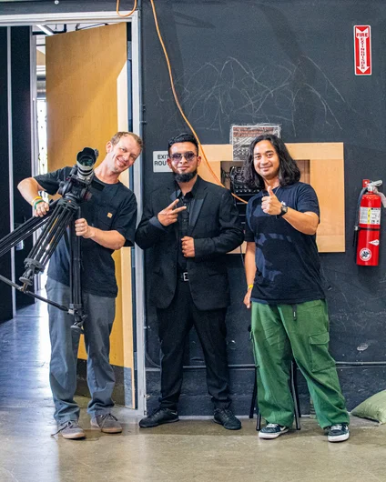 Frank and Sam checking in with the MIB aka our security for the day. I am not sure how secure the premises were honestly, kids found out we had pizza and slipped past this guy no problem.

<!--damnamla2023finals-->