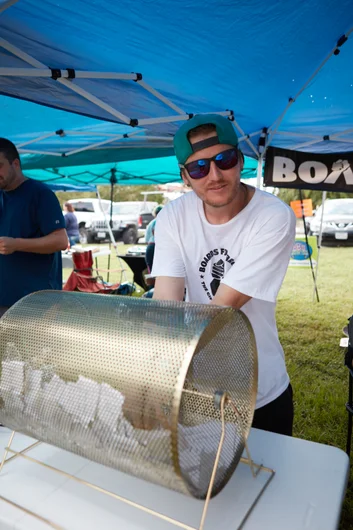 Tim pulling prizes with his signature smile on his face. <!--b4btexas21-->