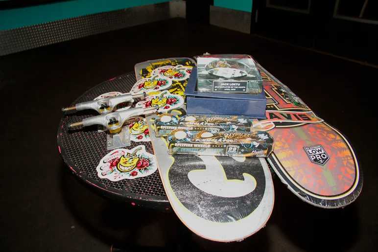 <!--eotmapr16-->
A peek at the prizes. Custom crystal ashtray and a nice package from DLXSF. We hook our employees up!