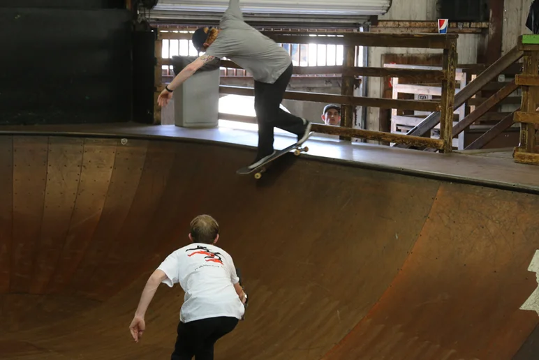 <!--eotmfeb16-->

Chris Reitz with a textbook back smith in the inside bowl and Frank behind him capturing the moment.