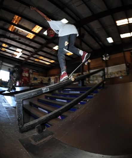 <!--springroll14-->

Ish Cepeda on a smooth backside overcrook down the rail.


