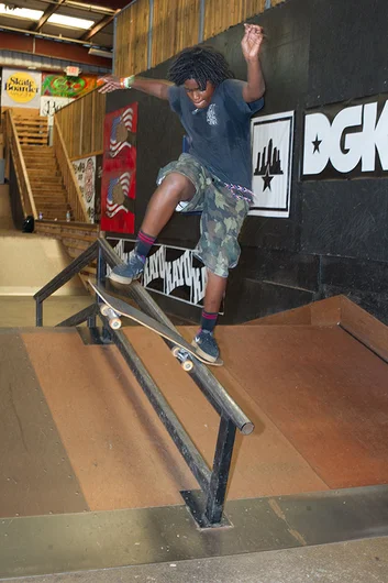 Yes, Jordan Bostick's back foot got right back on and stomped this frontside noseblunt slide.<!-- Go Skateboarding Day 2013 With Kayo -->