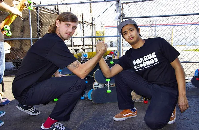 <!--b4bbbd-->

Jean-Luc Vida and Sam Bellipanni with the signature boards for bros handshake. They're down for the cause.