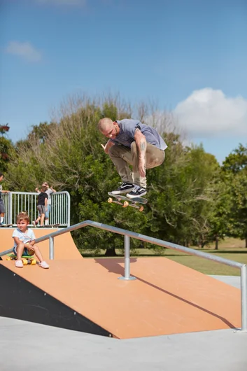 Brian boosts an ollie over a rail and a baby. <!--b4btexas21-->