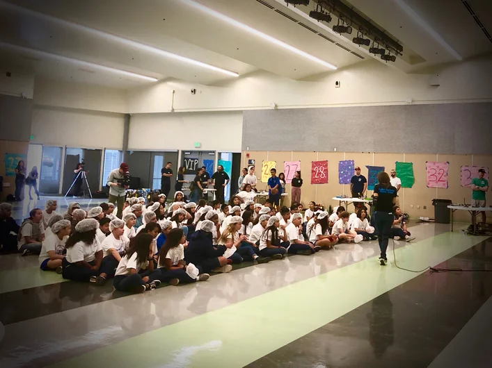 <!--vansgivesback19-->

We had three groups of over 80 students come though. Each group got some background on what we do and then went off to build skateboards and get lessons (the white caps are to keep the loaner helmets clean with all the sweating going on).