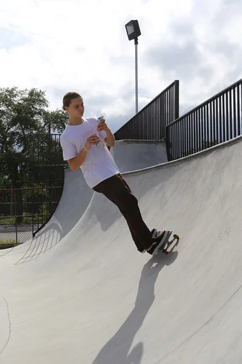 <!--eotmjuly-->

Gimpy is always multitasking. Here he is drinking, skating, and 
