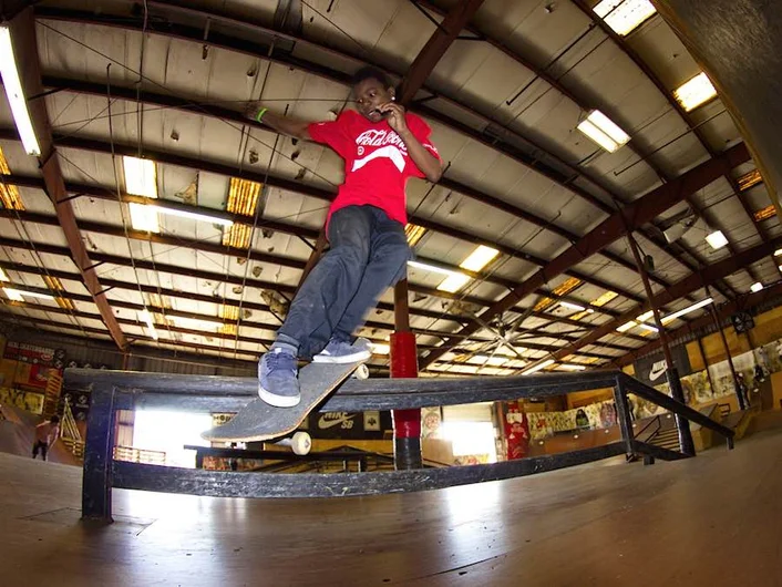 <!--b4bbbd-->

Chuckie Wooder with a stylish backside smith grind on the bump to rail.