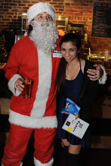 More gifting from drunk Santa.<!-- SPoT Employee Christmas Party at The Bricks 2012 -->