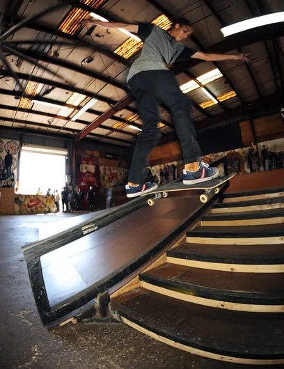<!--hj2014-->

Back on the course, the 16-and-up division was underway. Elijah Odom had a proper backside tailslide down the rail.



