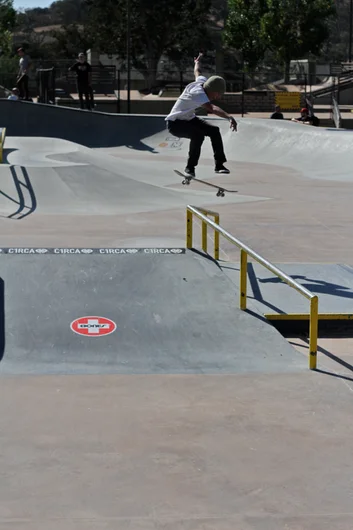 <!--dawwfri-->

Mateo Rael does a proper kickflip frontside boardslide. 