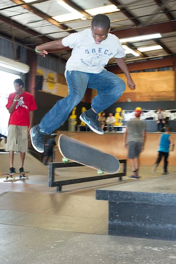 Jude Germain is one of three brothers here on a family skate session.  That's a kickflip off the ledge.<!-- Go Skateboarding Day 2013 With Kayo -->