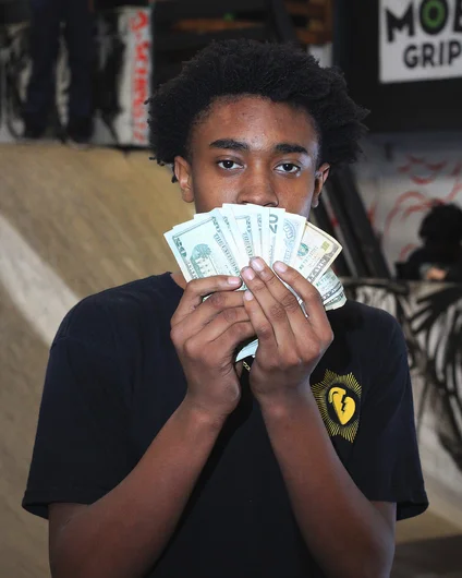 <!--cotc19deathrace-->

The Champ Keenan Lewis holding up that Prize Loot…$250 baby!

