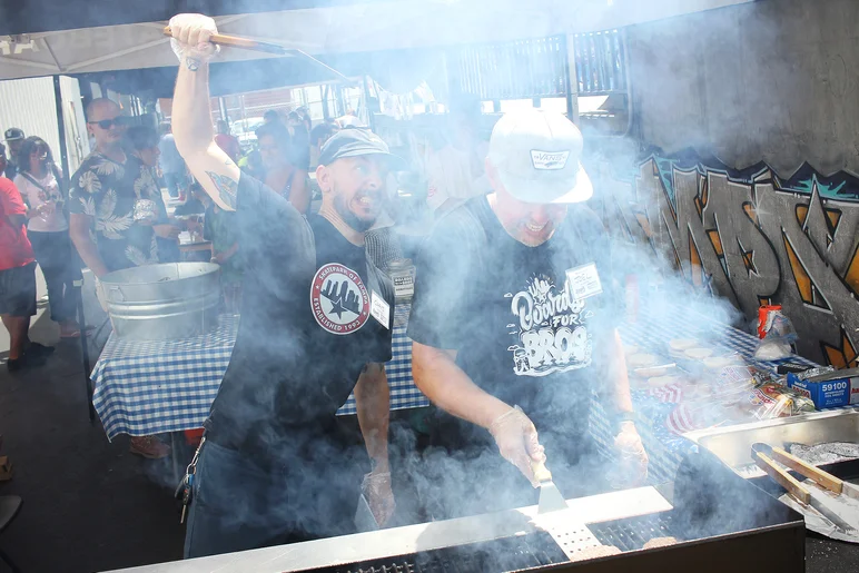 <!--askate18-->
The hottest job of the day goes to Michelle's husband Joel, (who also helps with Boards for Bros) and Crispy, who has clearly let the heat go to his head. 