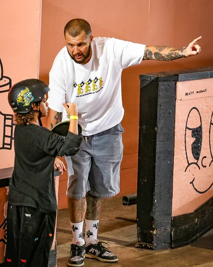 Matthew Barrios getting a little advice from Big Tim before he takes his run.

<!--schoolsoutjam2023-->