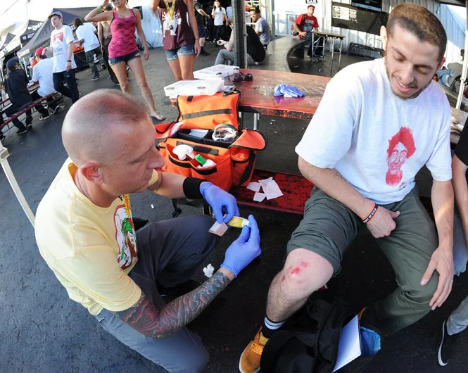 <!-- amdec13fri -->

Our medic Dave Miller had to patch up Dylan's knee after he took a nice little slam. Hopefully it's good by the semis, Dylan.