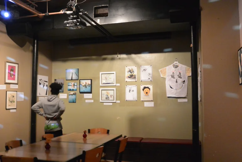 <!--bokmaartshow-->

Enjoying the art. Mark Gonzales donated 2 original sketches and again don't miss out on these. Mounted in white frames. They are in the center. SOLD OUT.