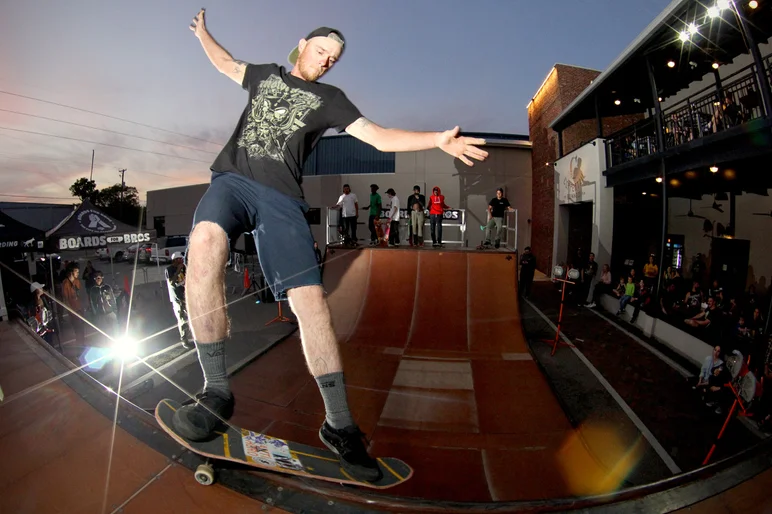 <!--coppertailphotos-->

Jacob Krajewski cruises through a Smith Grind with no regard for my poorly placed flash.