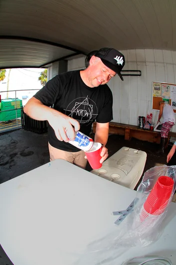 <!--eotmaug16-->

Joel Box is here at every event, mostly promoting Boards for Bros. Today he is helping everyone drink responsibly for free, thanks to PBR.