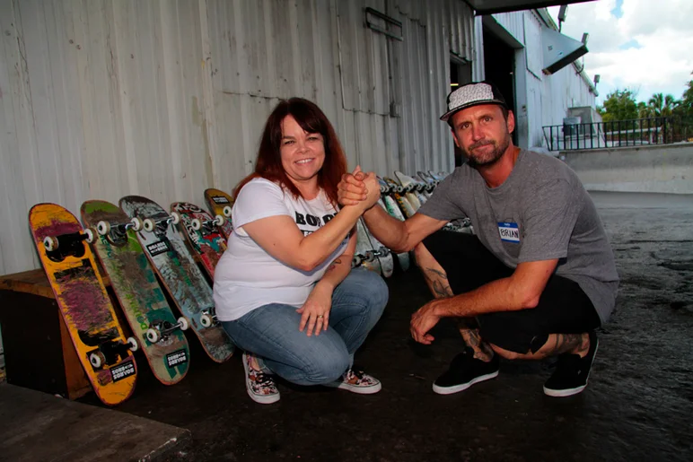 <!--b4b-photos-->

Michelle Box and Brian Schaefer, the leading members of Boards for Bros, in front of the boards set up for today.