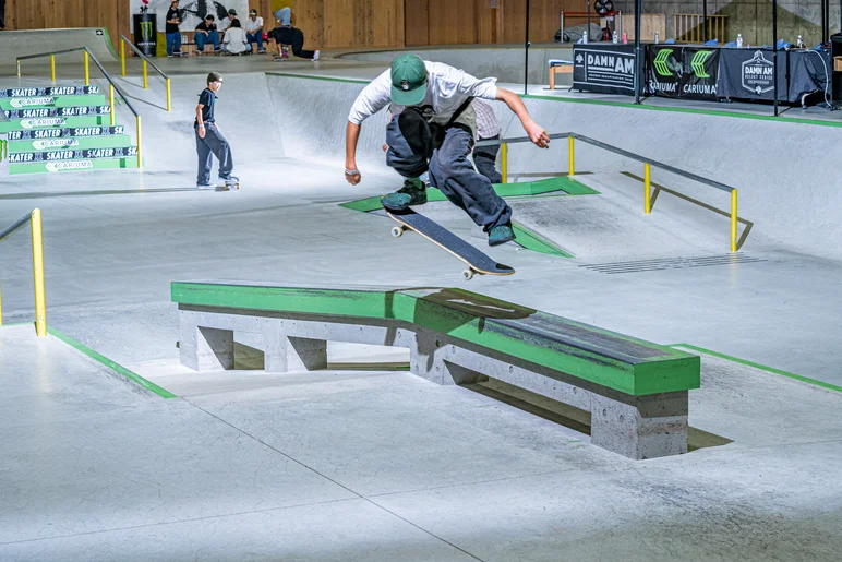 Joetaro catching a kickflip back footed before stomping it into a crook.

<!--damnamjapan2023mensqualifiers-->